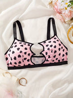 women's lingerie with multicolored cow print, milk front design with cutouts and heart-shaped diamond buckle