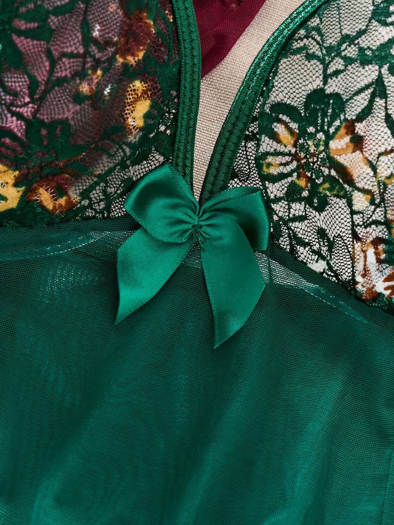 Close-up of a green lace garment with a bow detail