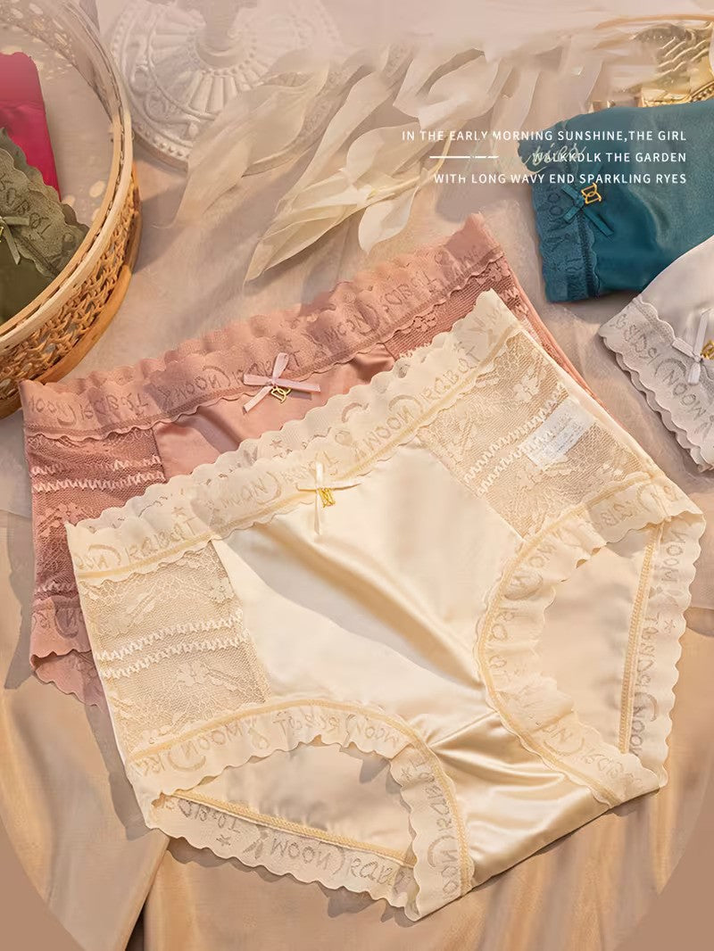 Pair of lace-trimmed underwear on a textured surface with a blurred background