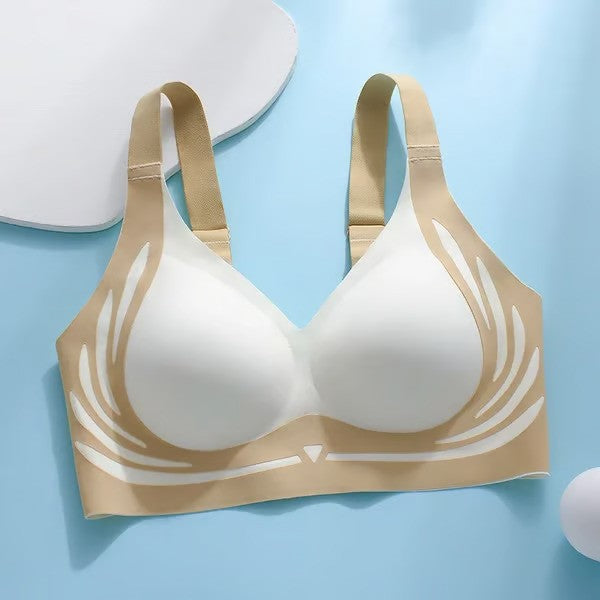 Beige and white bra on a light blue background